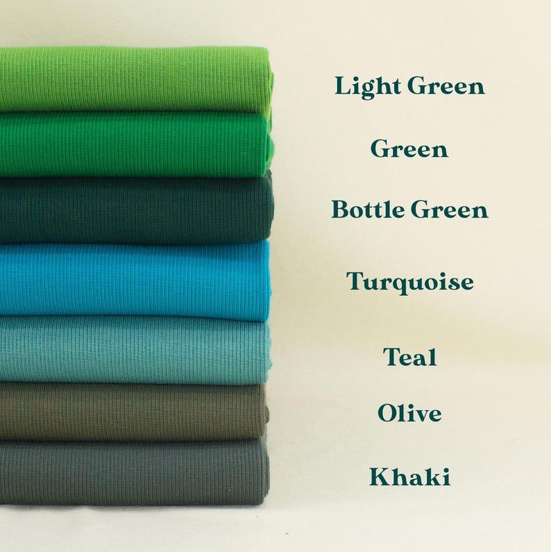 A stack of various fabric swatches in different colors, including Light Green, Green, Bottle Green, Turquoise, Teal, Olive, and Khaki.