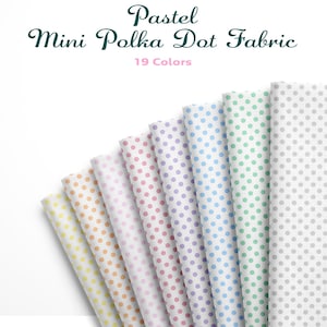 May include: A selection of pastel mini polka dot fabric rolls in a fan arrangement. The fabric features a variety of colours, including yellow, orange, pink, purple, blue, green, and grey. The text "Pastel Mini Polka Dot Fabric" is displayed at the top of the image.