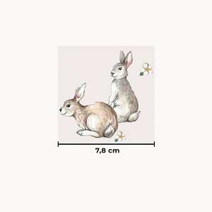 a drawing of two rabbits sitting next to each other
