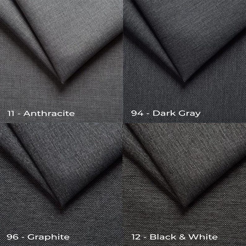 four different shades of dark gray fabric