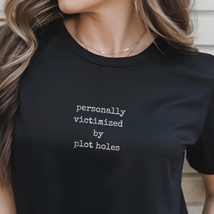 Victimized by Plotholes Tee – Funny Sarcastic Movie TV Show Lover Shirt