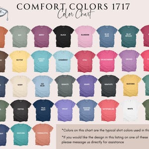May include: A color chart featuring a variety of t-shirt colors, including "Yam," "Berry," "Black," and "Blossom." The chart displays a range of hues, from dark to light, with the text "COMFORT COLORS 1717 Color Chart" at the top.