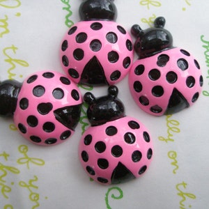 Lot de 4 cabochons roses coccinelles