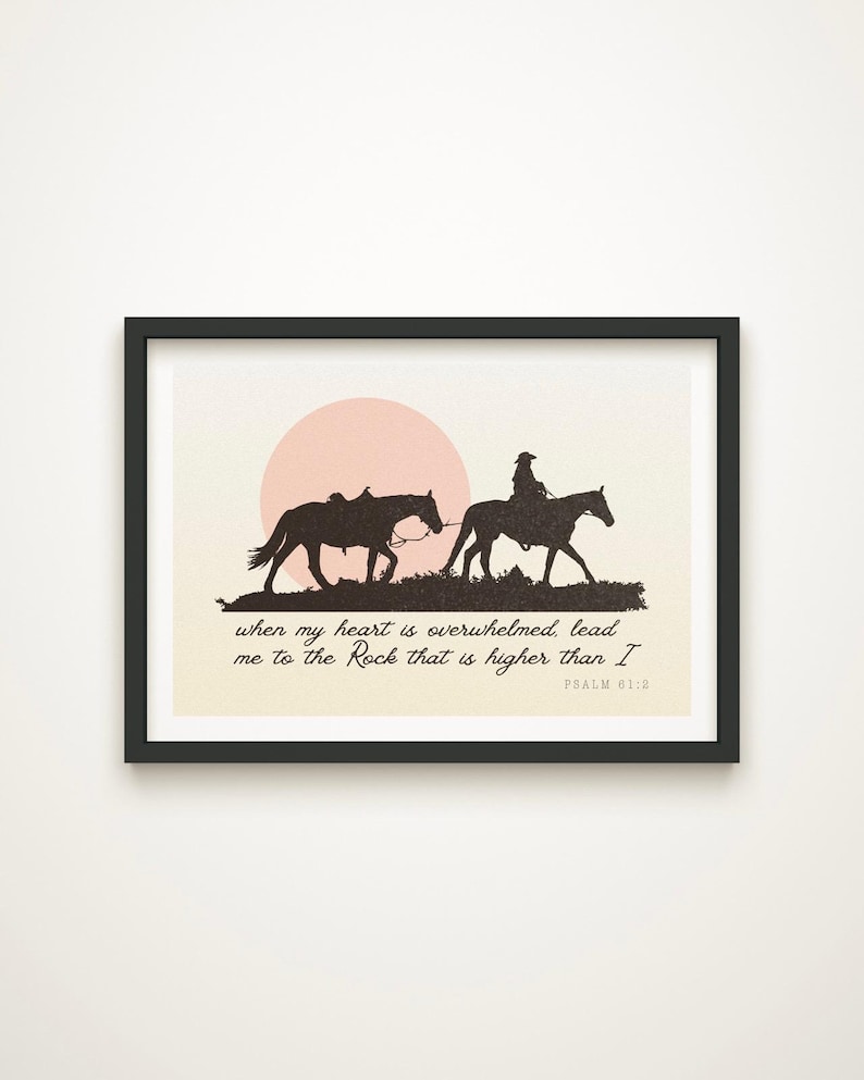 May include: A black and white silhouette of two horses and a rider against a pink sunset. The text "when my heart is overwhelmed, lead me to the Rock that is higher than I" is written below the image. The text "PSALM 61:8" is written below the quote.