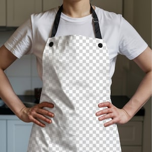 K&ouml;nnte beinhalten: Wei&szlig;er Sch&uuml;rze mit einem karierten Muster, schwarzen Tr&auml;gern und schwarzen Kn&ouml;pfen. Die Sch&uuml;rze wird &uuml;ber einem wei&szlig;en T-Shirt getragen. Die Sch&uuml;rze ist f&uuml;r den K&uuml;chengebrauch bestimmt.