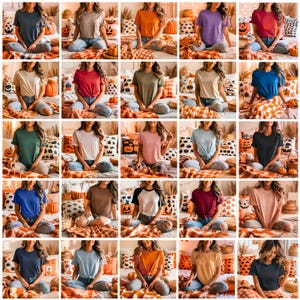 Könnte beinhalten: Eine Auswahl an kurzärmeligen T-Shirts für Damen in verschiedenen Farben, darunter Blau, Orange und Rosa. Die Shirts werden auf einem Bett mit herbstlichen Dekorationen wie Kürbissen und dekorativen Kissen präsentiert. Die Shirts sind aus einem weichen Material gefertigt.
