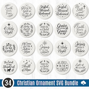May include: A collection of 34 white Christian ornament designs with black text and decorative elements. Each circular ornament features inspirational phrases like "Faith Over Fear" and "Joy to the World". The text "Christian Ornament SVG Bundle" is also present.