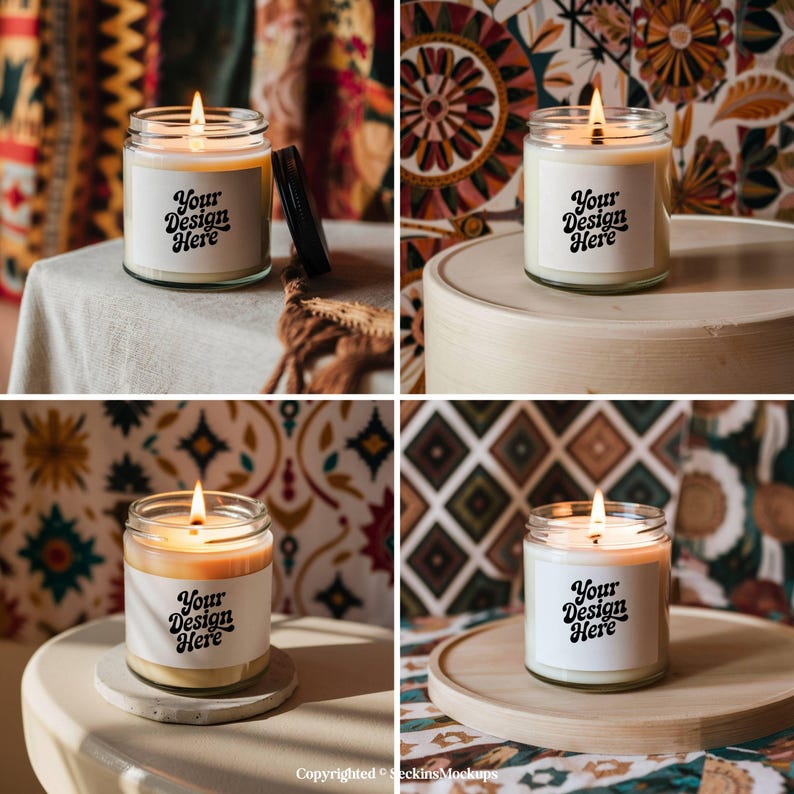May include: Four lit candles in glass jars with the text "Your Design Here" on white labels. The candles are on various surfaces, including a table and a wooden tray. The background features colorful patterned fabrics.