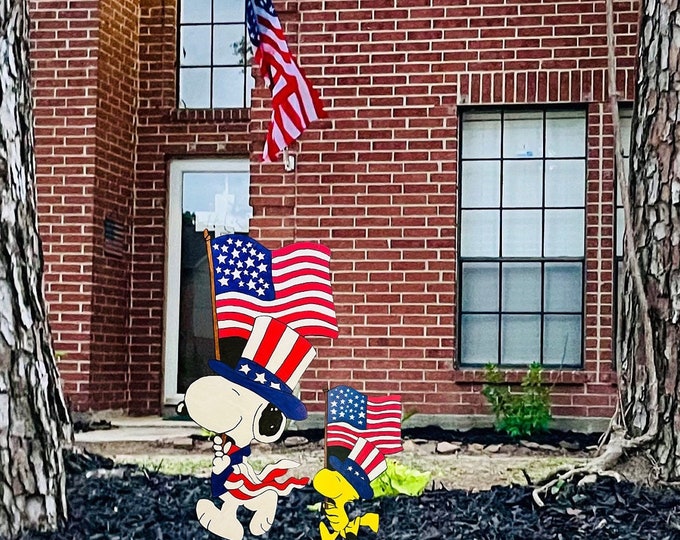 Featured listing image: Charlie Brown Friends Patriotic Snoopy and Woodstock Yard Ornaments