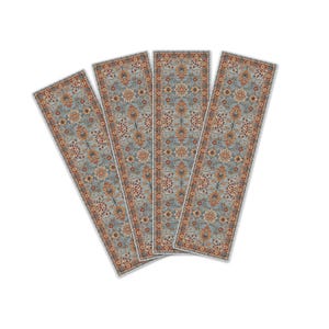 May include: Four rectangular rugs with a traditional floral pattern. The rugs have a light blue background with orange, brown, and cream-colored floral designs. The edges are bordered with a cream-colored trim.