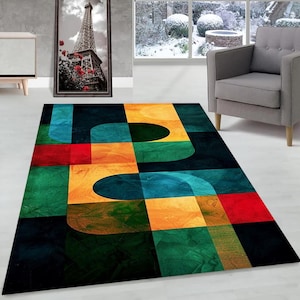 Könnte beinhalten: Abstrakter geometrischer Teppich mit einem farbenfrohen Design in Blautönen, Grün, Gelb und Rot. Der Teppich hat einen modernen und zeitgenössischen Stil.
