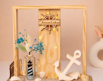 Decoración náutica LED con ancla y faro, personalizable, marco de madera con arena y conchas, ideal para regalar a amantes de la costa, accesorio náutico para el hogar