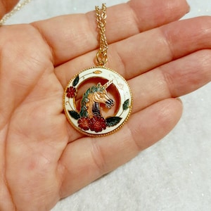 Vintage cloissone enamel unicorn pendant, left-facing