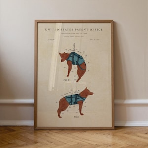 May include: Framed vintage patent print from the United States Patent Office, featuring diagrams of a dog wearing a harness. The print has a tan background with brown and blue illustrations, and is encased in a wooden frame.