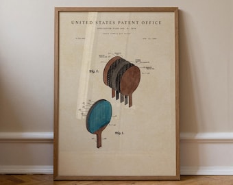 May include: Framed vintage patent print of a table tennis bat design. The print features detailed diagrams and text from the United States Patent Office. The illustration shows the bat's construction and components, with a blue and brown color scheme.