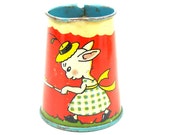 1930s Tin Toy Tea Pot. BUNNY Girl girl playing a game by Ohio Art.