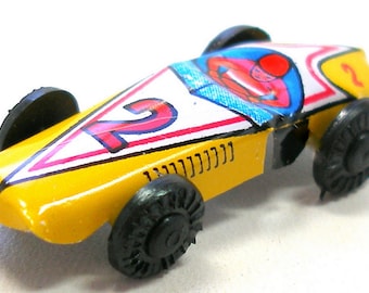 Yellow Tin Toy Racer, 1960s Japanese mini car no. 2. Race car. Vintage fun!