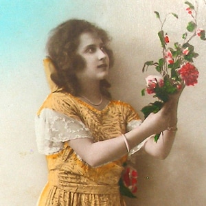 1910s French postcard. Lady with flowers. RPPC real photo, paper ephemera. Carte Postale. Vintage glamour fashion