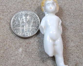 1 3/4" Frozen Charlotte doll from Germany. Antique porcelain. Blond hair.