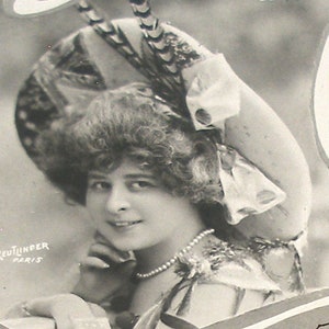 1900s French postcard. Edwardian lady in hat. Antique RPPC real photo, paper ephemera. Carte Postale. Vintage glamour fashion. Reutlinger.