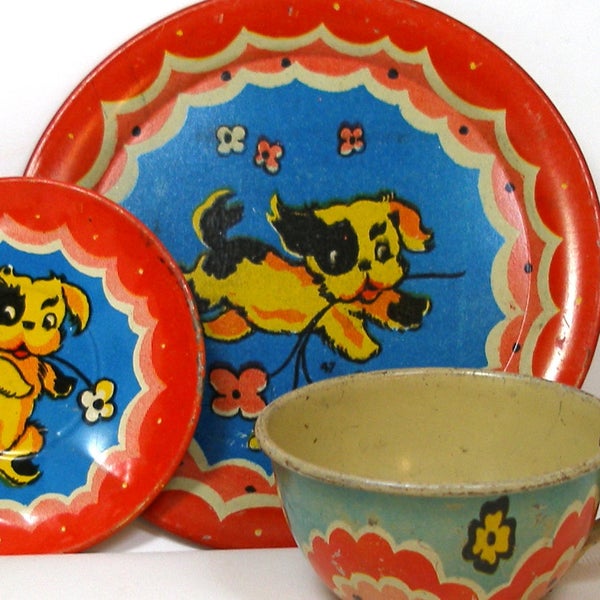 40's Tin Toy Tea Set. Naughty Puppy, Cup, plate, saucer. 3 piece setting.
