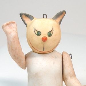 1920s Bisque Comic Cat doll. Kitty with articulated arms & legs. Made in Germany. 4". Nodder.
