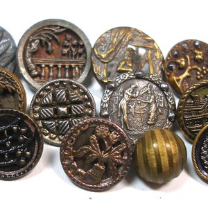 12 Antique BUTTONS. 1800s Victorian & vintage metal shabby chic picture buttons.