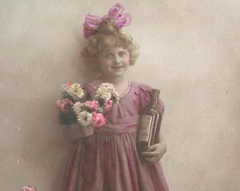 1910s postcard. Edwardian Girl with flowers. RPPC real photo postcard, Vintage glamour fashion, carte postale