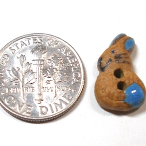 Tiny Bunny button. Happy hare, handmade ceramic rabbit in brown & blue, 3/8&quot;.