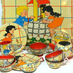 1940&#39;s tin toy tea set, Ducky Bath Time. Litho by Ohio Art Co. 21 piece set.