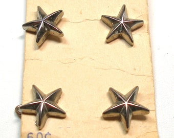 4 silver star BUTTONS. Plastic with 5 point star. 5/8" La Mode.