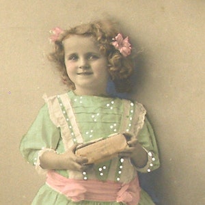 1910s French New Years postcard. Edwardian girl with present. RPPC real photo postcard, Vintage glamour fashion, carte postale.