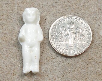 Teeny tiny Frozen Charlotte doll from Germany. Itty Bitty size. 1"  Smallest size. Doll BB.