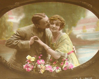 1920s French postcard, romantic couple. RPPC. Real photo postcard, paper ephemera. Carte Postale. Vintage collectible.