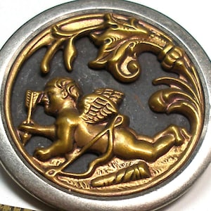 Antique CUPID button. Antique Victorian Eros, cherub, 1.5 inches. Cupid at rest. Mythology.