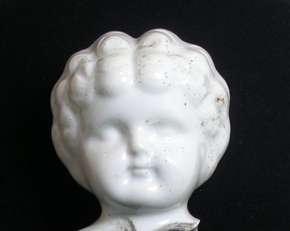 antique china doll heads