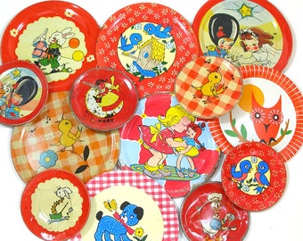 13 Tin Toy tea saucers in reds, 1950s-1960s graphics. Instant Collection. Ohio Art Co. Vintage Decor.