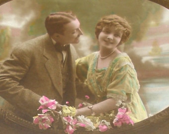 1920s French postcard, romantic couple. RPPC. Real photo postcard, paper ephemera. Carte Postale. Vintage collectible.