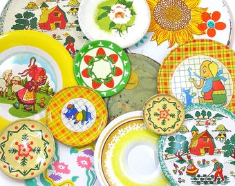13 Tin Toy tea saucers in yellows, 1960s graphics, Instant Collection. Ohio Art Co. Vintage Decor.