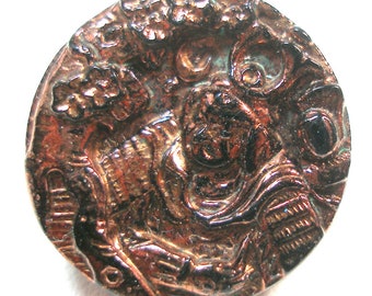 Samurai Warrior button. Victorian black glass with copper luster. 11/16". Vintage collectables.