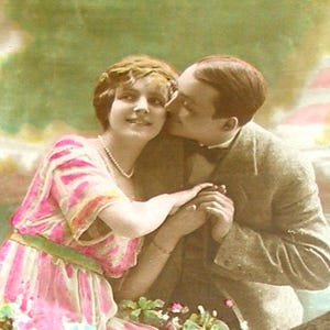 1920s French postcard, romantic couple. RPPC. Real photo postcard, paper ephemera. Carte Postale. Vintage collectible.