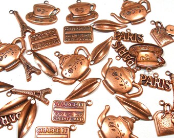 SALE 30 assorted copper colored charms.  Tea pot, Paris, Eiffel Tower, charge card, luggage tag, leaves, tea cup.