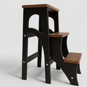 May include: A dark brown wooden step stool with two steps and a top platform. The steps and top are a lighter wood color. The step stool has a modern design with curved supports and visible hardware.