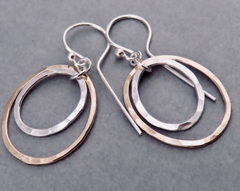 Mixed metal double hammered ring dangle earrings in sterling silver and gold filled, artisan metalsmith long boho hand forged earrings