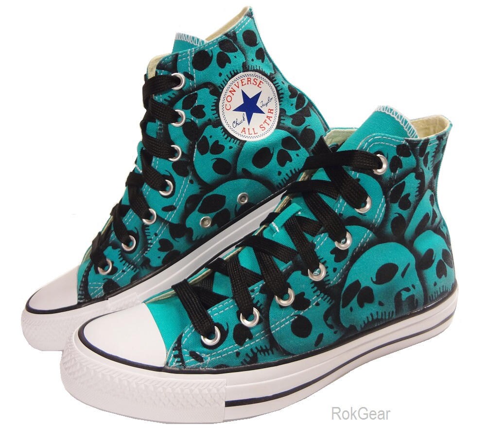 Converse with top skulls on them
