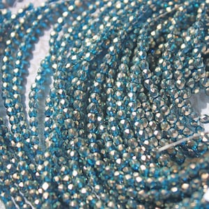 3mm Fire Polish Halo Azurite Czech glass beads (100 beads) 2 strands.