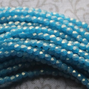 2mm Fire Polish Sueded Gold Capri Gold (100 beads) 2 strands.