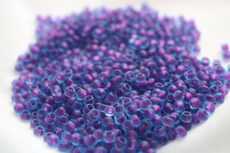 20 gram bag 60 Purple Lined Aqua Matte Toho seed bead Color#TR-6-06-252FM