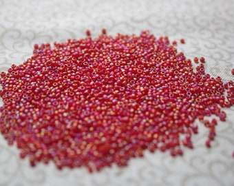 15/0 Matte Dark Ruby Transparent Rainbow Toho seed bead, 10-gram bag, TR-15-165CF