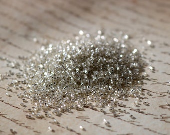 15/0 cut seed bead S/L Crystal by Miyuki, 10 gram bag, Color# 15C-1